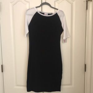 Solid black Lularoe Julia with White Sleeves